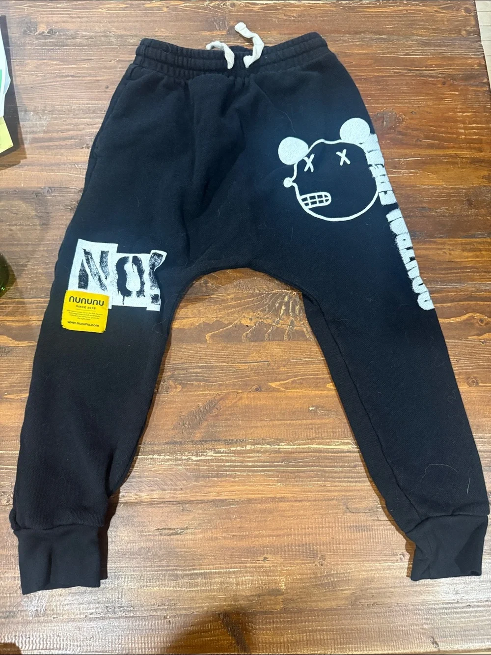 nununu Black Jogger Sweatpants with White Graphic